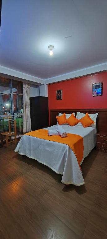Postel nebo postele na pokoji v ubytování Hostal Bryan
