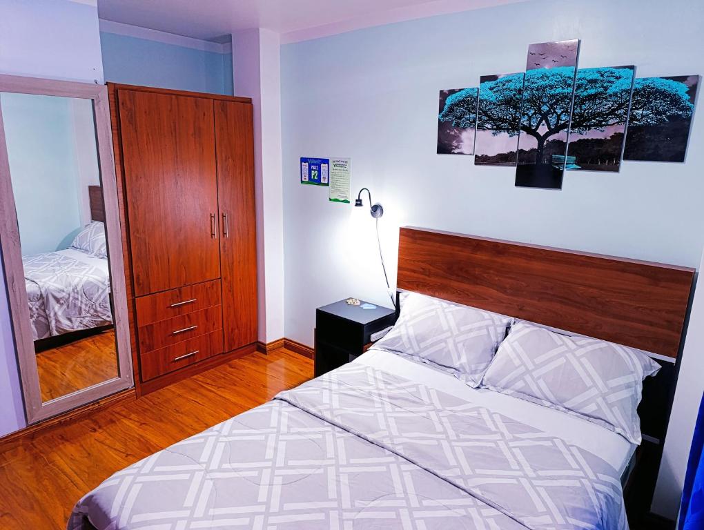 Postel nebo postele na pokoji v ubytování Hostal Valle Andino