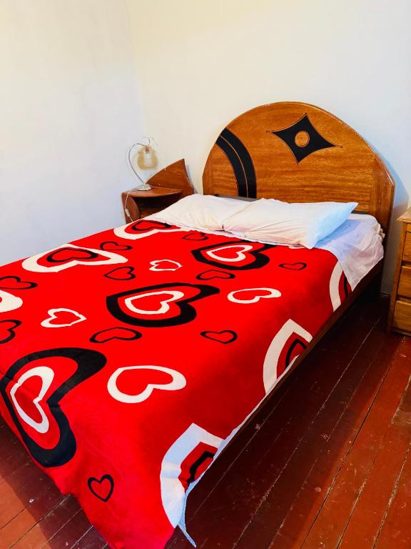 Postel nebo postele na pokoji v ubytování Ukumari Hostel