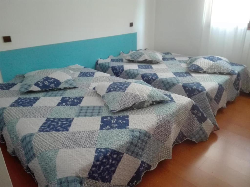 Postel nebo postele na pokoji v ubytování Ideal Camping hotel Stagnolo