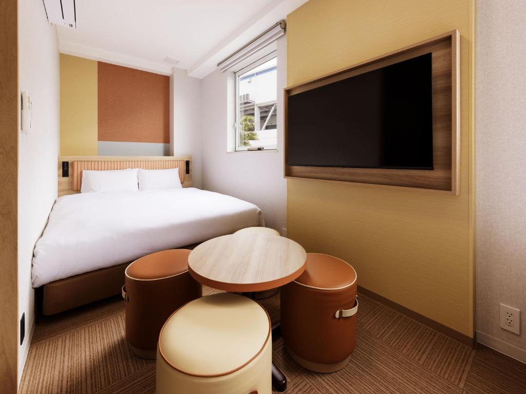 TV a/nebo společenská místnost v ubytování CVS Bay Hotel