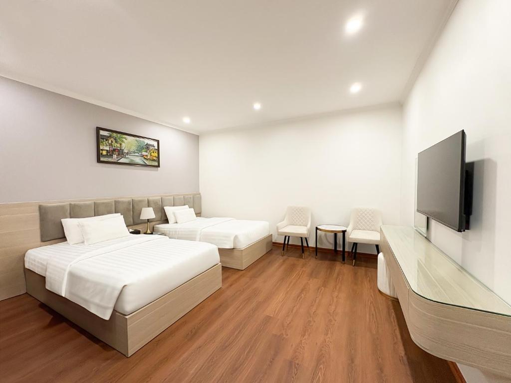 TV a/nebo společenská místnost v ubytování A25 Hotel - Hoàng Đạo Thúy 2