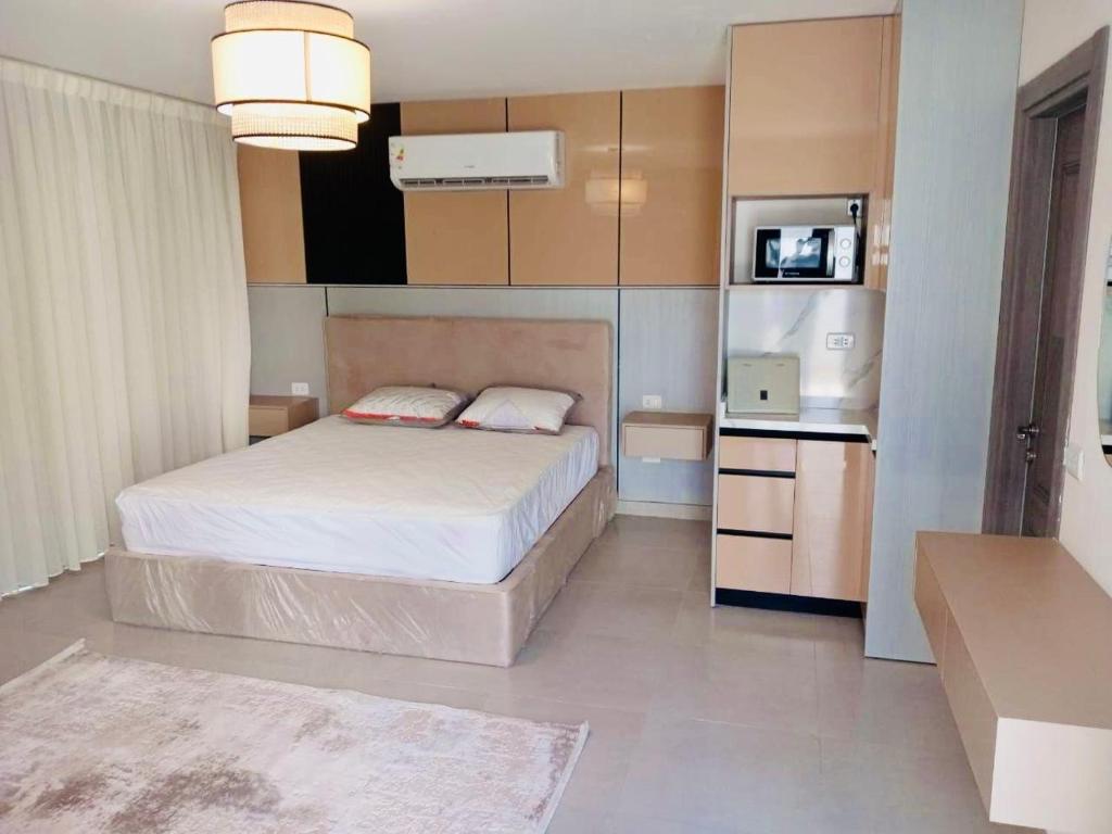 Curated visual reference: Exclusive Hotel Apartment Reference: Luxury Hotel Apartment Sodic Eastown Cairo Updated Prices 2026