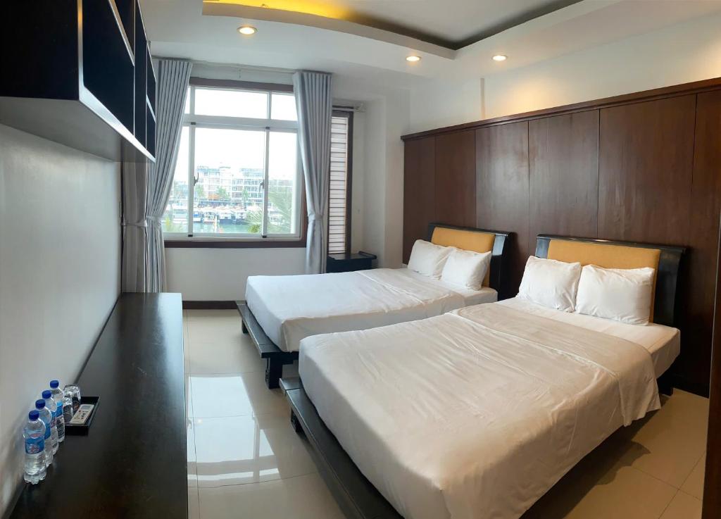 Postel nebo postele na pokoji v ubytování SOCHU HOUSE- Tuần Châu Homestay & Coffee