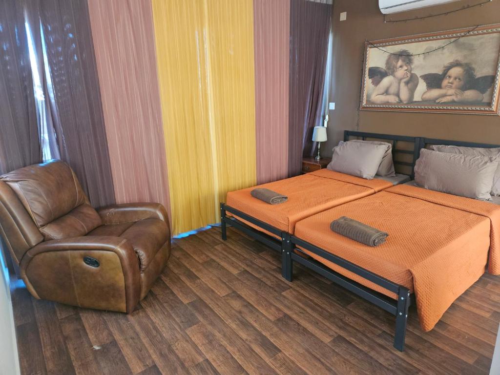 Postel nebo postele na pokoji v ubytování Lotus Guest House Malta