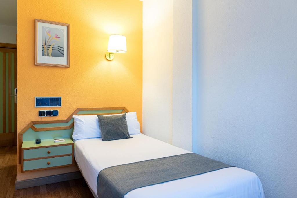 Postel nebo postele na pokoji v ubytování Hotel Alda Guijuelo