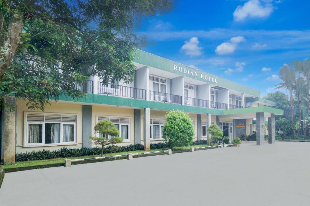 a rendering of a hotel with a parking lot at Hotel O Bogor near Taman Safari formerly Hotel Rudian 1 in Bogor