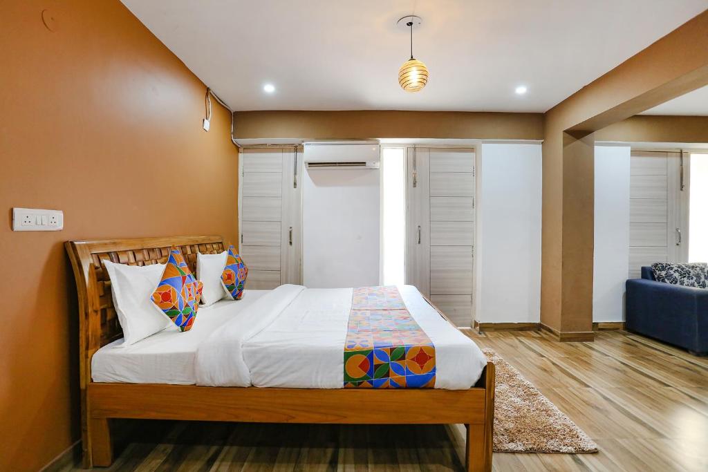Postel nebo postele na pokoji v ubytování FabHotel Sky Rise Inn