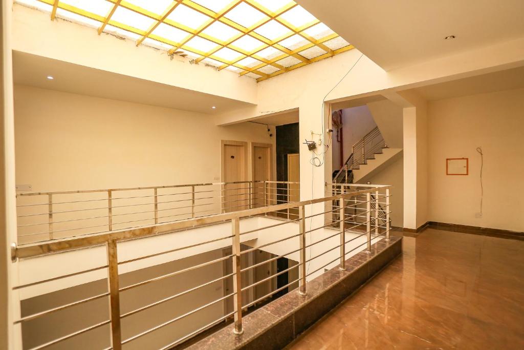 Postel nebo postele na pokoji v ubytování FabHotel Sky Rise Inn