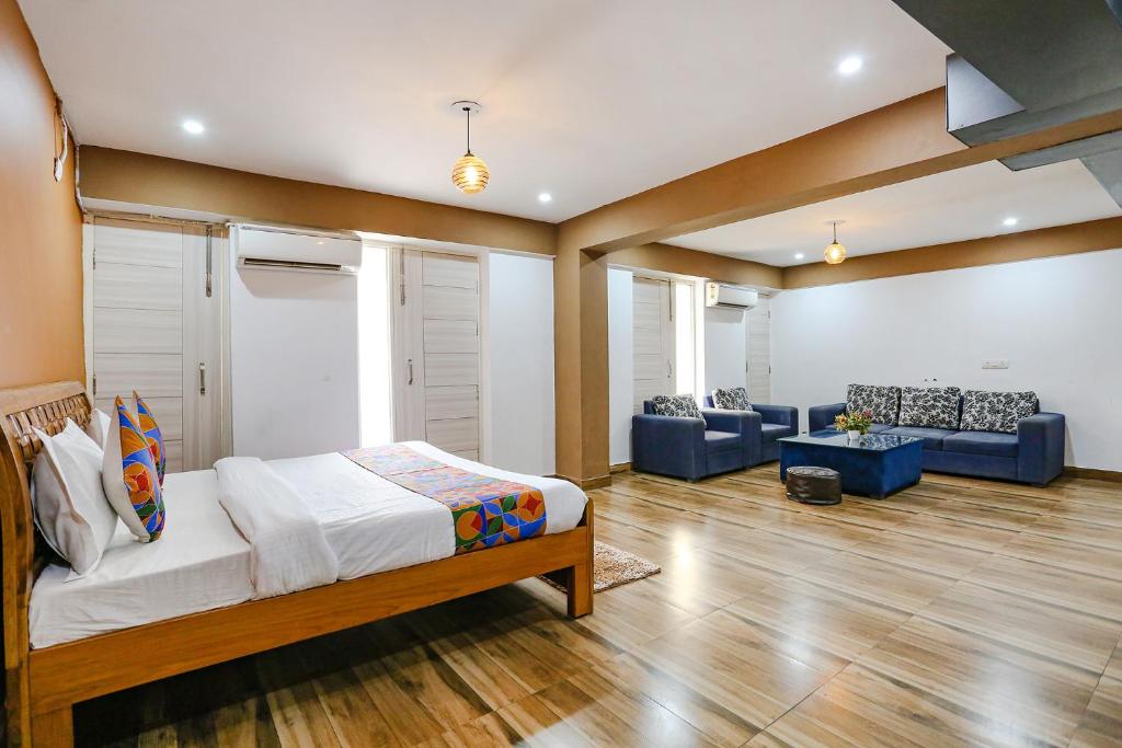 Postel nebo postele na pokoji v ubytování FabHotel Sky Rise Inn