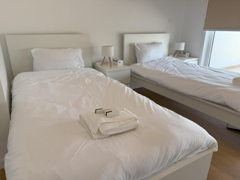 Postel nebo postele na pokoji v ubytování DIOM Luxe Hostel - Next to AUH & Yas Island