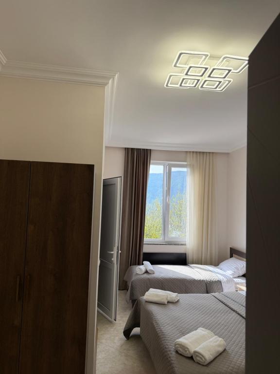 Postel nebo postele na pokoji v ubytování Guest House MD