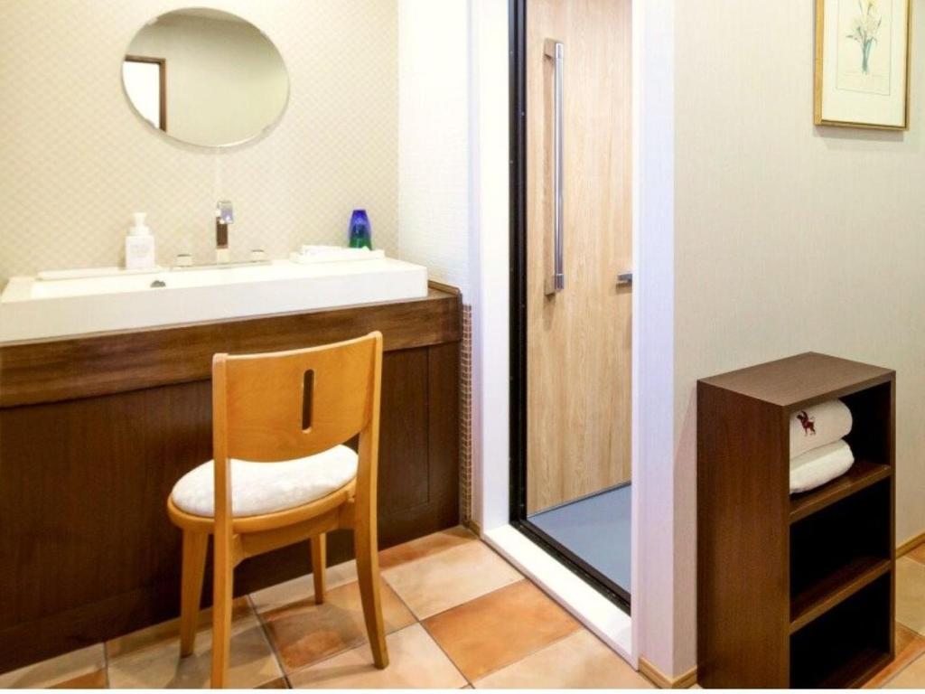 Koupelna v ubytování Hotel Claire Higasa