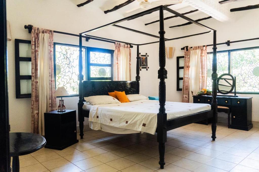 Postel nebo postele na pokoji v ubytování Sunny garden rooms Watamu