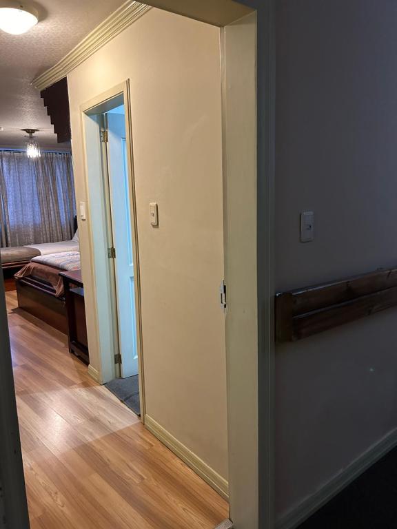 Postel nebo postele na pokoji v ubytování IÑAQUITO GOLD hostal
