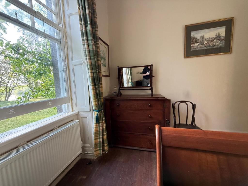 TV a/nebo společenská místnost v ubytování Shannon River House & Gardens