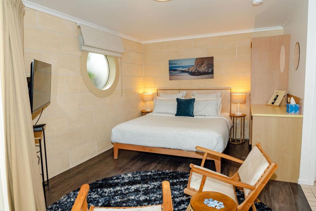 Postel nebo postele na pokoji v ubytování Portside Motel
