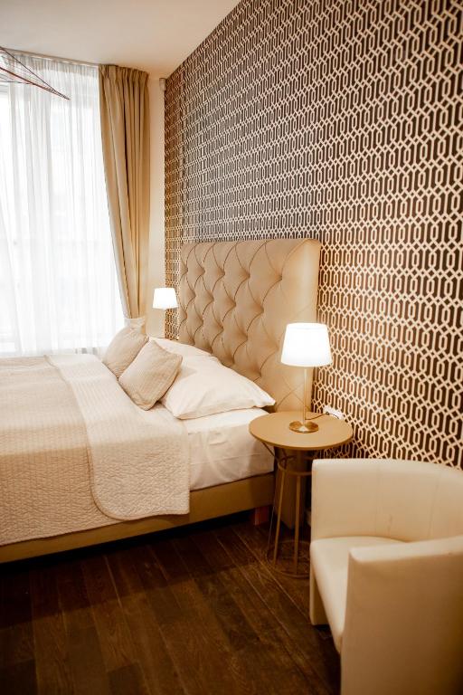 Posteľ alebo postele v izbe v ubytovaní Luxury Modern Designed Oldtown Apartment