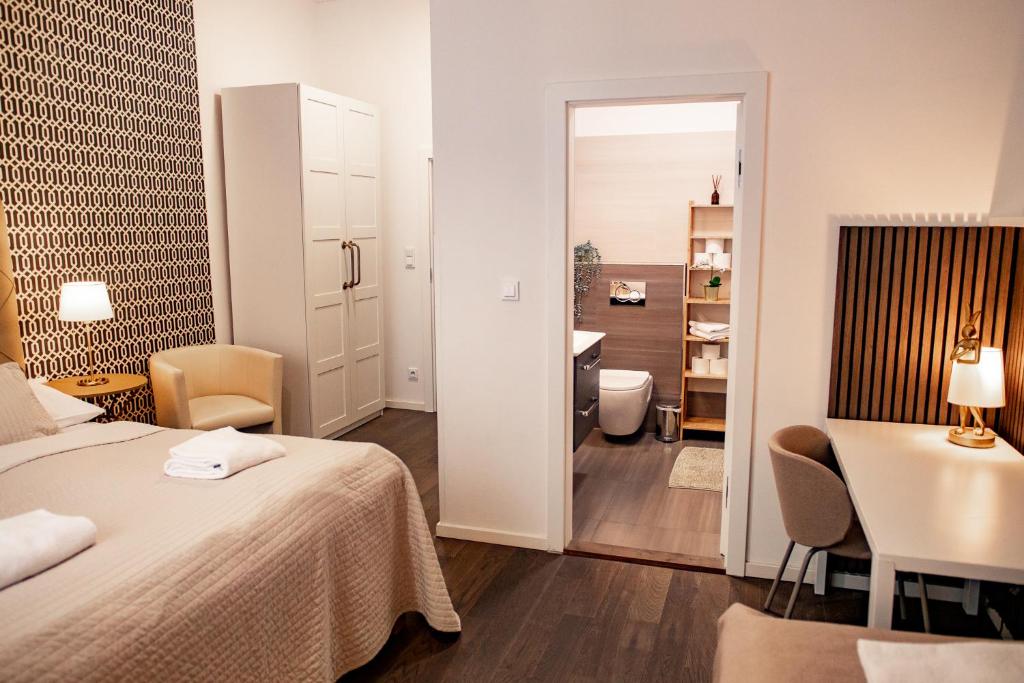 Posteľ alebo postele v izbe v ubytovaní Luxury Modern Designed Oldtown Apartment