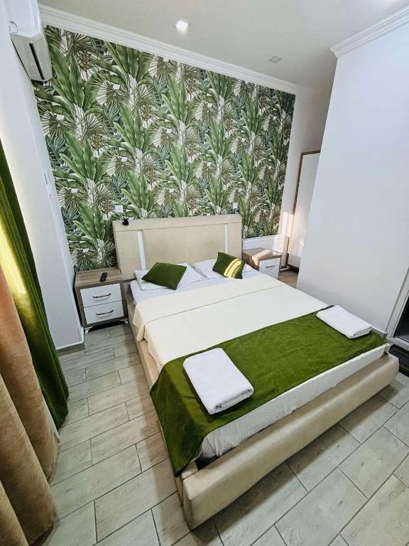 Postel nebo postele na pokoji v ubytování Nikas Guest House