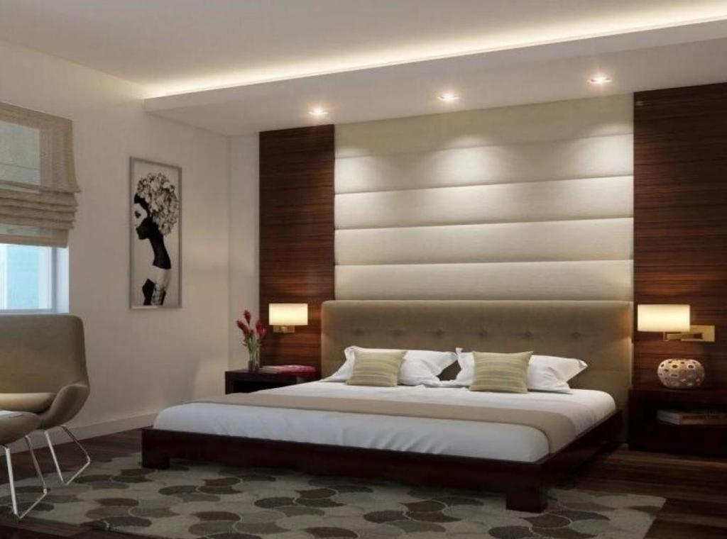 Postel nebo postele na pokoji v ubytování Hotel EL DE Olive Aero Suites Near IGI Airport
