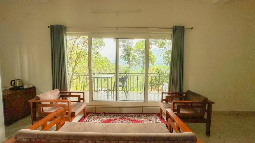 Postel nebo postele na pokoji v ubytování Forestscape Resort Munnar