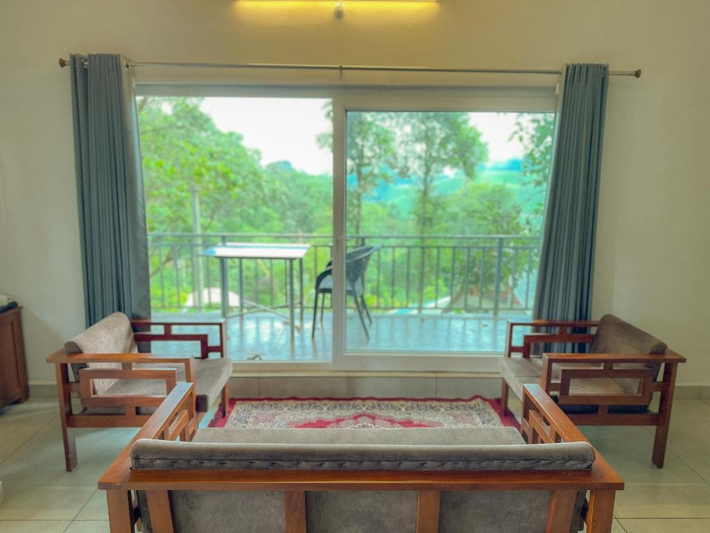 Balkón nebo terasa v ubytování Forestscape Resort Munnar