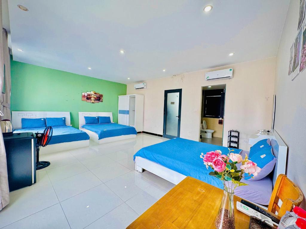 Postel nebo postele na pokoji v ubytování Mila Homestay Grand World Phú Quốc