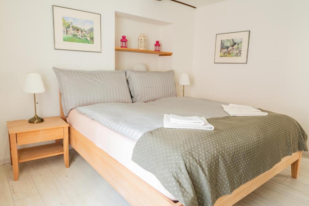Postel nebo postele na pokoji v ubytování Locanda Poncini