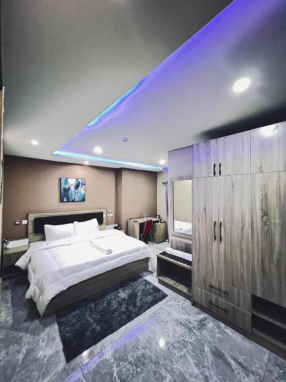 Postel nebo postele na pokoji v ubytování Macdestly Apartment