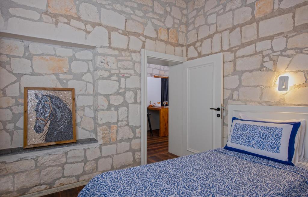 Postel nebo postele na pokoji v ubytování Yusalis Garden Hotel