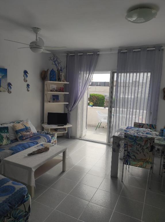 Posteľ alebo postele v izbe v ubytovaní Mi morena cala llobeta 35
