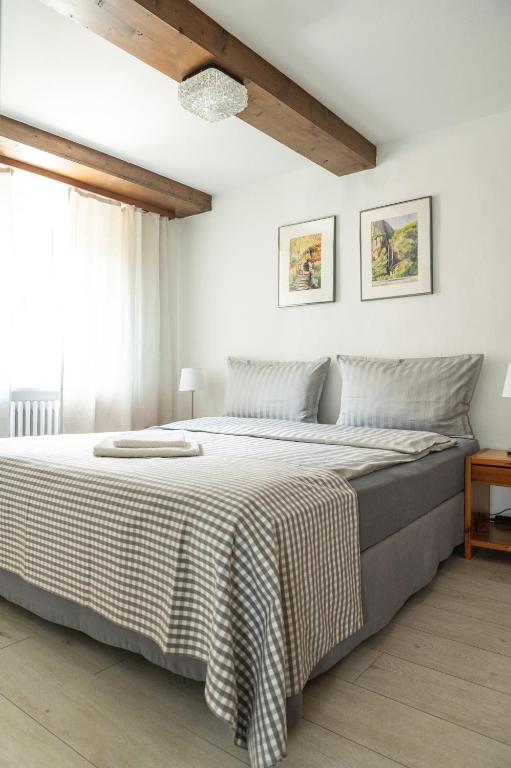 Postel nebo postele na pokoji v ubytování Locanda Poncini
