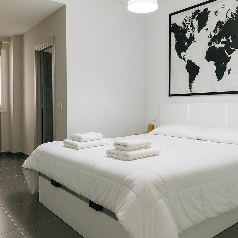 Posteľ alebo postele v izbe v ubytovaní Viveiro MSuites