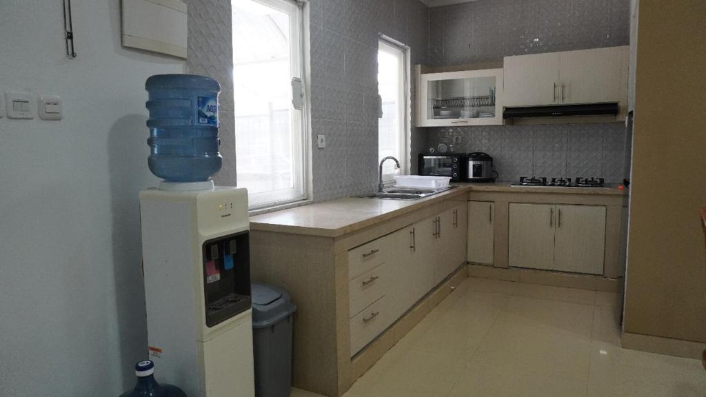 Kuchyň nebo kuchyňský kout v ubytování Diyar Villas Puncak K3/9