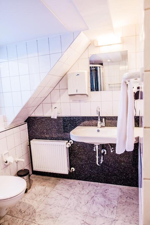 Koupelna v ubytování Hotel Martinihof