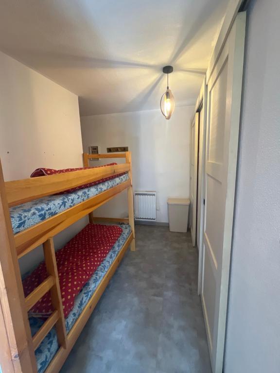 Postel nebo postele na pokoji v ubytování Evasion Alpine