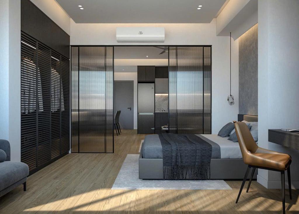 a bedroom with a bed and a desk and a chair at HighClass Suites - Walk-To-Independence Palace, SaiGon's Heart in Ho Chi Minh City