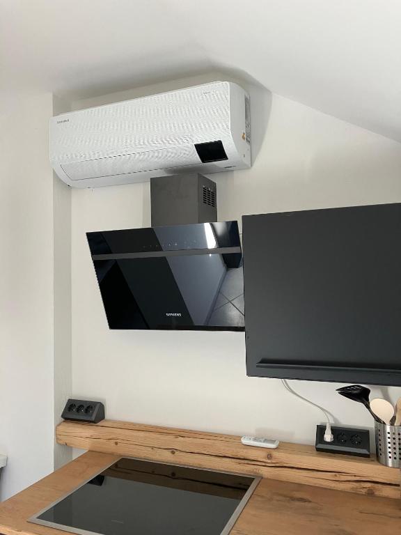 TV a/nebo společenská místnost v ubytování Appartement Liebhart