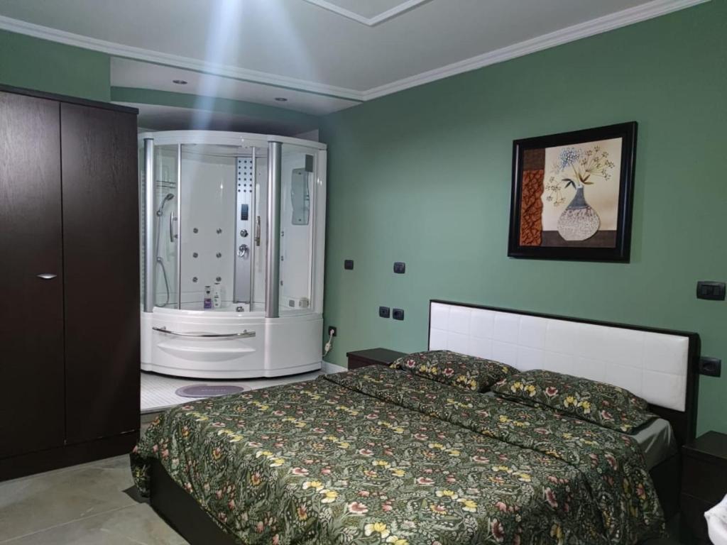 Postel nebo postele na pokoji v ubytování Andi guest house