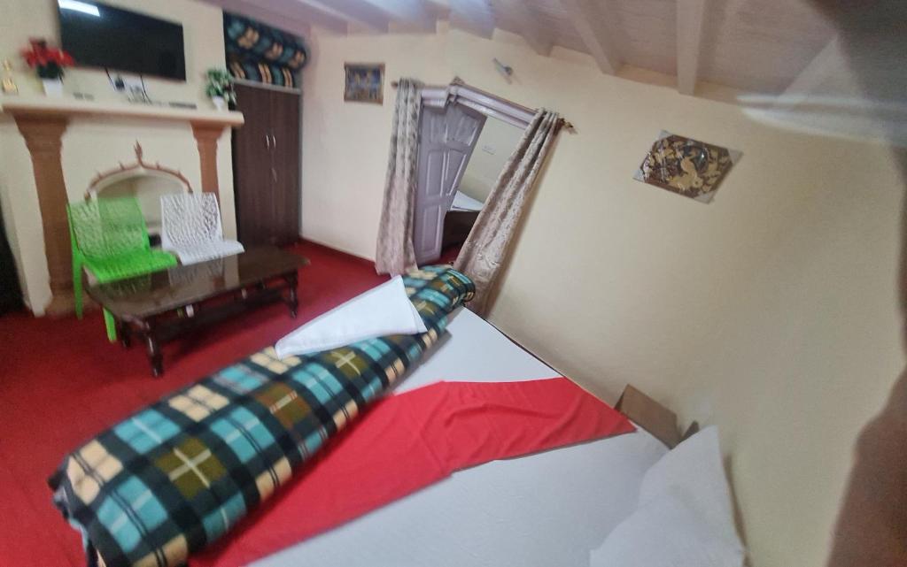Postel nebo postele na pokoji v ubytování The Heritage jasmine lodge B&B