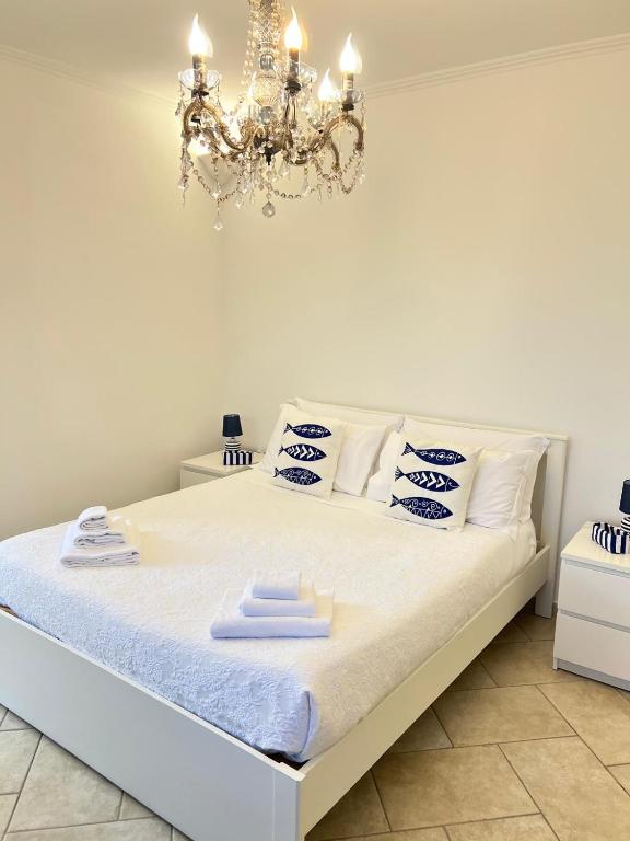 Postel nebo postele na pokoji v ubytování Villa Valentina Suite