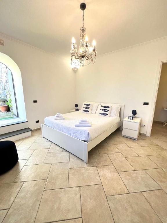Postel nebo postele na pokoji v ubytování Villa Valentina Suite