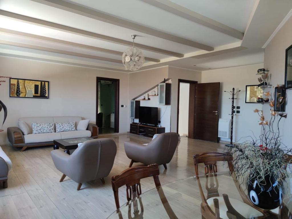 TV a/nebo společenská místnost v ubytování Andi guest house