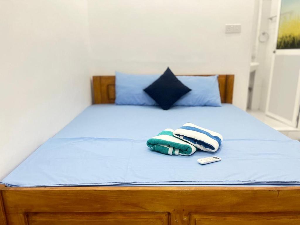 Postel nebo postele na pokoji v ubytování Trinco Sailu Inn
