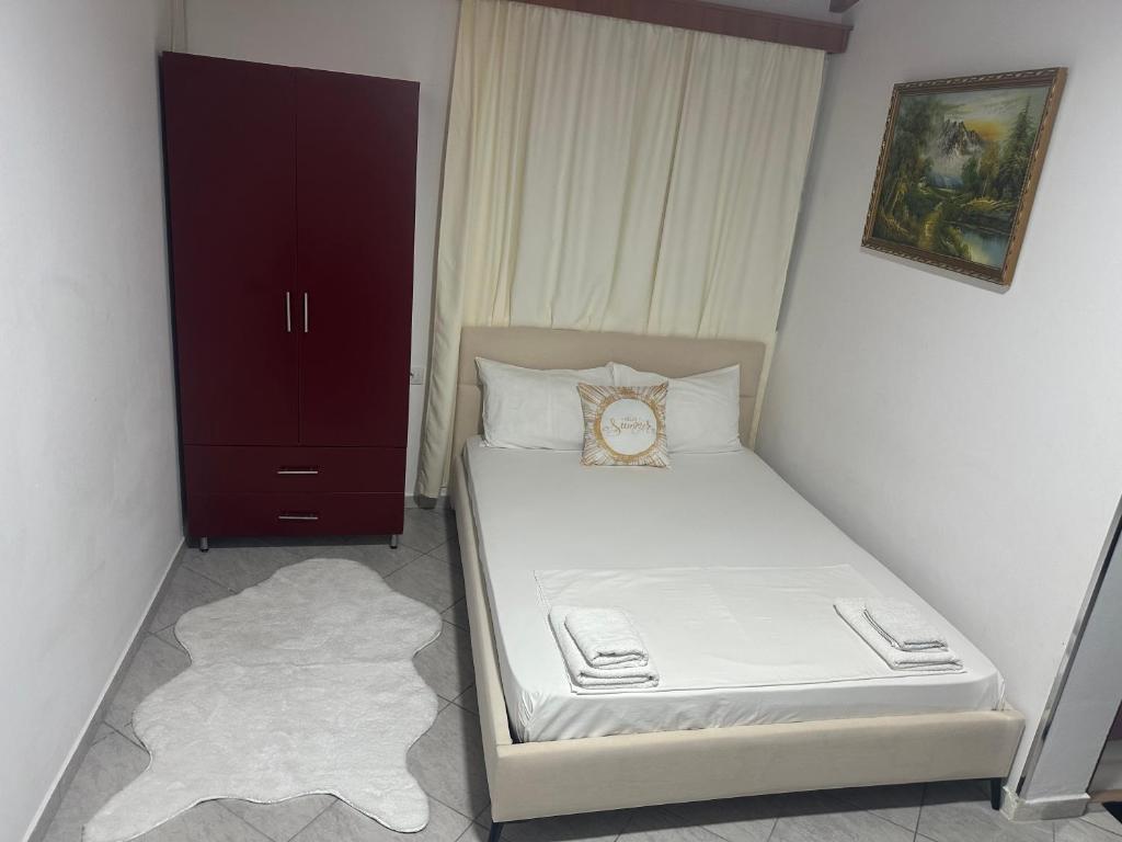 Postel nebo postele na pokoji v ubytování Vila Reni Risi
