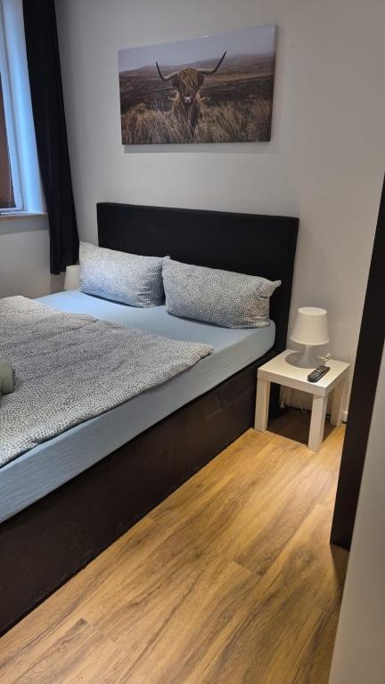Ένα ή περισσότερα κρεβάτια σε δωμάτιο στο Stadtnah an der Förde 5703