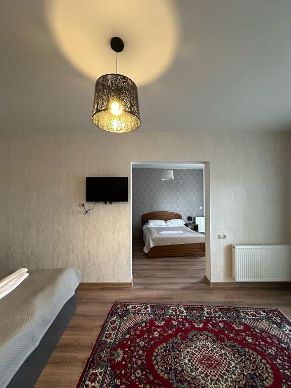 Postel nebo postele na pokoji v ubytování Hotel Terrace Rabath
