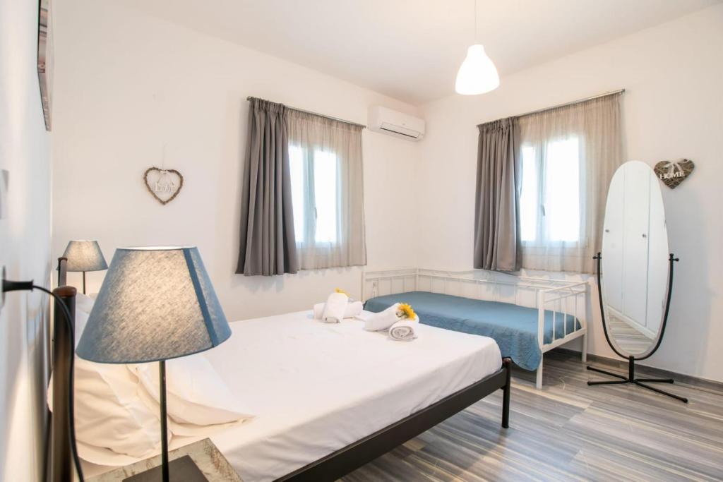 Posteľ alebo postele v izbe v ubytovaní 3bedroom Cycladic home Casa Klea in Drios Paros