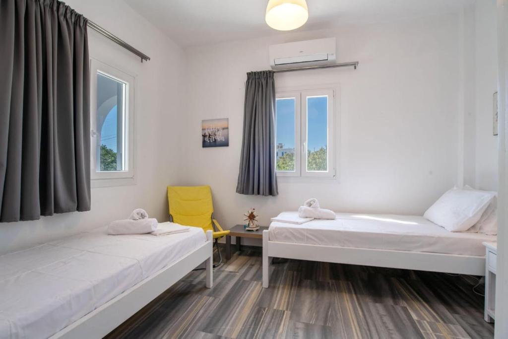 Posteľ alebo postele v izbe v ubytovaní 3bedroom Cycladic home Casa Klea in Drios Paros